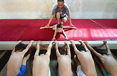 young camp gymnastics tiny china children school boy bent drilled teacher girl boot their chinafotopress getty via stretch paces putting