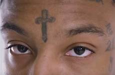 savage forehead tells meanings larry tattooed