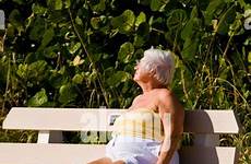 beach palm sun shores florida large asleep sunbathing woman alamy elderly stock teenage portly deck man sand haired gray mature