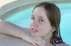 teen girl swimming stock