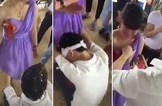 groped ritual blindfolded bridesmaid guest bemused