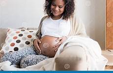 pregnant african woman bedroom female preview