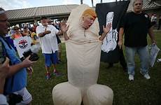 trump penis donald giant man dressed costume primary florida people symbol mask yuge trolls seen provokes reactions sorts however such
