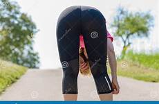 over bending woman rear athletic fit viewed sportswear preview