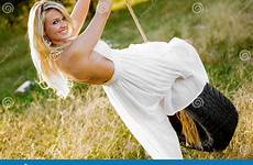 cowgirl blonde girl rope farmgirl tire sexy swing woman