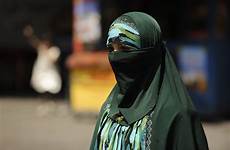 wearing xinjiang authorities uighur voa veils covering pakai jubah wsj muslimah muslim urumqi astaghfirullah melarang warns islamisation creeping official terkait
