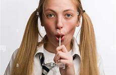 schoolgirl school sucking uniform teenage lollypop stock alamy wearing