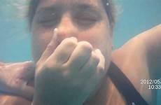 underwater breath holding pool wife