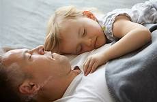 daughter father sleeping sofa