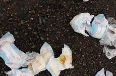 diapers soiled outside filled dumped elderly feces jeans couple