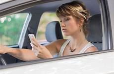 driving texting while phone woman using mobile young car claim affect person slows reaction time stock