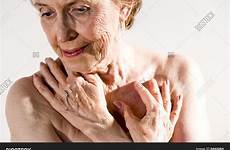 woman wrinkled skin senior elderly scams aging anti wrinkles seniors age sad stock