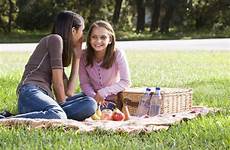 picnic girls park having two stock girl preview