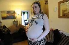 bloated stomach pregnant woman look her