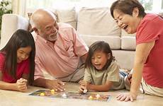 grandparents grandchildren raising family children kids game board between night care babysitting ties living
