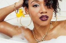 american foam swag laying flawless selfie afro bath wearing lifestyle jewelry making teen modern young girl preview