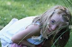 squat child nature urinate girl pee garden stock alamy call close summer very meadow liquid