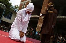 marriage whipping punishment whipped aceh banda sebatan harrowing sobbing sharia punishments rappler