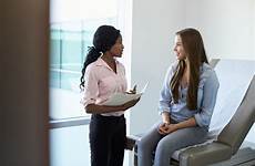 exam doctor teenage patient female interviewing teen room office motivational talking meeting procedures young health medical adolescent stock doctors gynecology