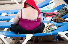 sunlounger obese bum alamy