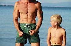 dad bod father back son beach boy fathers taking arms call muscles sorted family