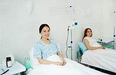 bed hospital young woman lying happy dissolve stock pressmaster d187