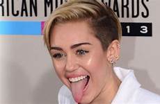cyrus miley tongue raunchy criticised bangerz antics parents tour health volumes hygiene speaks invited turns offer penis down twitter afp