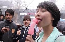 penis japanese giant touch festival huge phallic city people clamour crowds ceremony where fertility