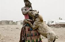 hyena men nigeria man africa nigerian hugo pieter photographer beast relationship understand strange visited adetokunbo abiola better geographic