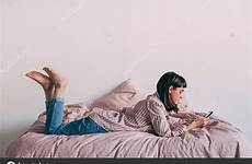 lounging bed hipster girl stock coffee depositphotos