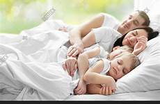 family sleeping bed background