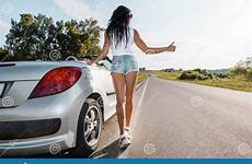 sexy hitchhiking girl car broken road