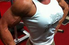 muscular bodybuilder bodybuilding biceps flexing shredded crossfit quads lifting