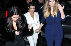 kardashian kim khloe cleavage night girls corset popping eye shows off ensemble sister wearing which