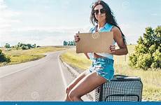 hitchhiking woman road pretty young cardboard suitcase empty waiting plate along country her preview