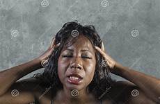 tormented intense dramatic stressed anxious desperate feeling crazy african face woman young american expression express headache girl