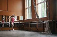 ballerina performs acrobatics