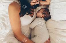 sleeping son bed mother baby newborn boy young women