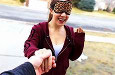 wife surprise husband blindfolds