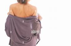 undressing woman young rear bathroom alamy