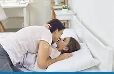daughter bed kiss mother day lying happy morning hugs girl white gives while dreamstime stock