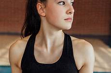 girl teen gymnastic gymnastics gym teenage gymnast ball stocksy practising rhythmic teenager portrait