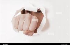 punching hole fist wall stock alamy paper woman