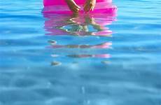 raft girl inflatable blonde stock