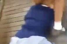 girl schoolgirl her knocked being girls shoved stomped shows stomps head shocking college student down bullies zealand them another