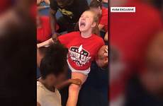 forced cheerleaders splits into video painful disturbing videos school high denver public