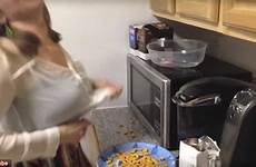 drunk wife her cooking shows hot while husband she goldfish crackers off begins pouring munchies onto walking plate clip article