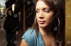 woman being stalked followed stock thug stalker royalty following man depositphotos her dreamstime