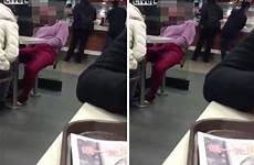 woman caught public masturbating mcdonald herself her video inside while touch people genitals touches self appears sleeping videos repeatedly his
