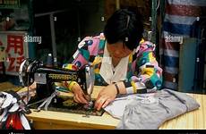 sewing woman chinese machine work china seamstress city alamy stock beijing municipality